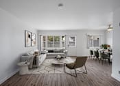 Thumbnail 6 of 55 - A living room with a grey sofa, a coffee table, and a dining table with chairs at Hillsdale Garden Apartments, 94403