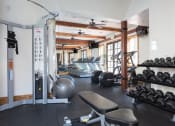 Thumbnail 7 of 23 - Fitness Center with Cardio Equipment and Weights