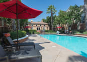 Thumbnail 5 of 28 - Outdoor pool and loungers