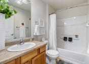 Thumbnail 8 of 37 - a bathroom with a bathtub toilet and sink