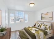 Thumbnail 38 of 51 - a bedroom with a large bed and a window
