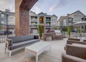 Thumbnail 18 of 33 - our apartments have a large patio with furniture and a grill