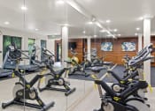 Thumbnail 9 of 30 - a gym with a lot of exercise equipment at Allez, Redmond, WA