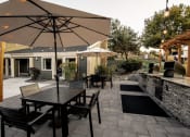 Thumbnail 12 of 27 - Outdoor Dining & BBQ Area