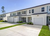 Thumbnail 9 of 30 - White and gray townhomes for rent