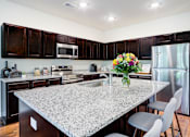 Thumbnail 12 of 30 - Granite countertops in kitchen