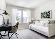 Thumbnail 6 of 30 - Spare bedroom with desk and futon