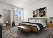 Thumbnail 3 of 29 - A modern bedroom with a large bed and a large window.