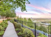 Thumbnail 13 of 22 - exterior walkway with beautiful sunset view