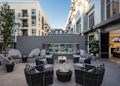 Thumbnail 7 of 28 - outdoor lounge and fire pit