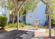 Thumbnail 24 of 53 - our apartments in a city have a picnic table and grill at Enclave, Paramount, CA 90723