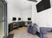 Thumbnail 32 of 53 - a room filled with furniture and a flat screen tv at Enclave, California, 90723