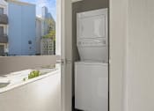 Thumbnail 47 of 53 - a white refrigerator freezer sitting next to a window at Enclave, Paramount, CA 90723