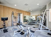 Thumbnail 5 of 38 - a gym with weights and cardio equipment at the community empowerment center