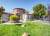 Thumbnail 1 of 38 - a house with a driveway and a lawn in front of it