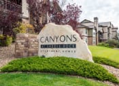 Thumbnail 11 of 33 - the sign in front of the canyon at saddle rock apartments