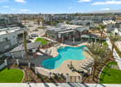 Thumbnail 17 of 36 - An aerial view of the resort style pool with cabanas and sun deck at Cardinal 95 new apartments in Glendale, AZ.