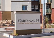 Thumbnail 36 of 36 - a sign for cardinal 95 luxury apartment homes in front of a building