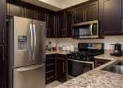 Thumbnail 5 of 32 - City Place Apartments Kitchen