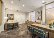 Thumbnail 2 of 32 - a conference room with chairs and a desk and a window