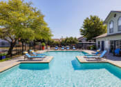 Thumbnail 24 of 33 - take a dip in the resort style pool at villas at houston levee west apartments