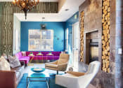 Thumbnail 15 of 24 - CLubroom with fireplace and purple couch