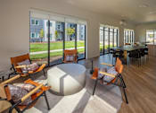 Thumbnail 30 of 34 - A modern living room with a large table and chairs at The Arvon, 98662