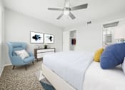 Thumbnail 4 of 21 - a bedroom with a large bed and a ceiling fan