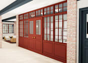 Thumbnail 13 of 26 - A red door with glass panels is the focal point of this image.
