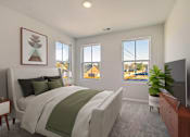 Thumbnail 16 of 30 - Primary bedroom with large windows