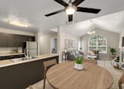Thumbnail 2 of 30 - A modern kitchen with a dining table and chairs.