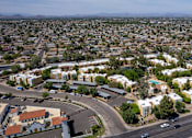 Thumbnail 11 of 18 - A view of a residential area with houses and roads.
