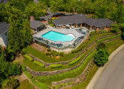 Thumbnail 31 of 38 - arial view of a home with a pool and manicured yard at Arbor Heights, Tigard, OR, 97224