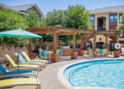 Thumbnail 16 of 35 - our apartments showcase a swimming pool