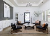 Thumbnail 2 of 35 - a living room filled with furniture and a large window