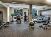 Thumbnail 30 of 30 - Fitness Center With Yoga/Stretch Area at AV8 Apartments in San Diego, CA