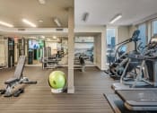 Thumbnail 29 of 30 - Fitness Center With Updated Equipment at AV8 Apartments in San Diego, CA