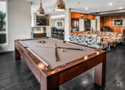 Thumbnail 24 of 30 - Pool Table in Clubhouse at AV8 Apartments in San Diego, CA