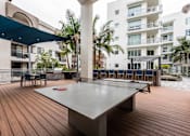 Thumbnail 11 of 34 - outdoor patio with ping pong table
