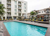 Thumbnail 1 of 34 - pool with seating