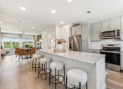 Thumbnail 1 of 50 - kitchen with island and seating