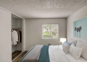 Thumbnail 10 of 25 - a bedroom with a large bed and a window