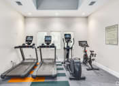 Thumbnail 38 of 59 - four treadmills and bikes in the gym at the monarch leasing center