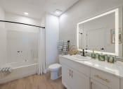 Thumbnail 21 of 59 - a bathroom with a sink toilet and a shower at Element 12 Apartments, Henderson NV