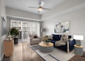 Thumbnail 1 of 30 - A living room with a blue couch and a ceiling fan.