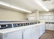Thumbnail 27 of 33 - Laundry room at Eagle Point Apartments, Albuquerque, NM