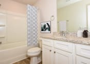 Thumbnail 23 of 60 - our apartments offer a bathroom with a bathtub
