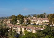 Thumbnail 21 of 28 - a view of a neighborhood with lots of houses and trees
