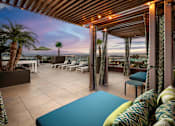 Thumbnail 3 of 29 - Rooftop lounge with cabana at AV8 apartments for rent in San Diego, CA.
