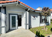 Thumbnail 18 of 22 - A small building with a sign that says Fitness Center.